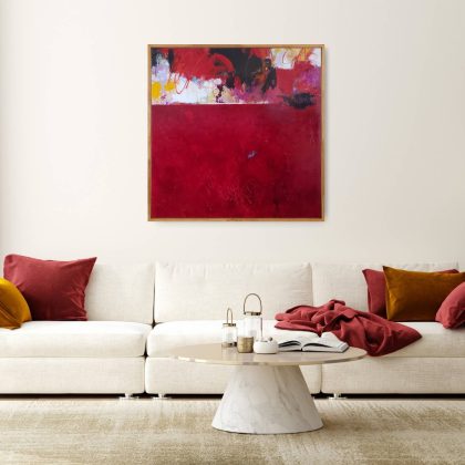 An image showing the abstract painting "Heart and Soul" by Kathryn Gruber hanging on a white wall in a living room environment.