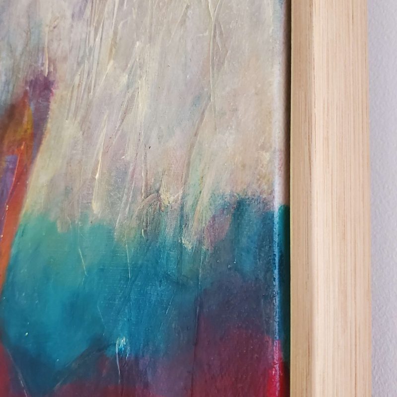 Side view of abstract expressionist painting, "Flowstate", by Kat Gruber, showing the view of the tasmanian oak floating frame and the top of the canvas.